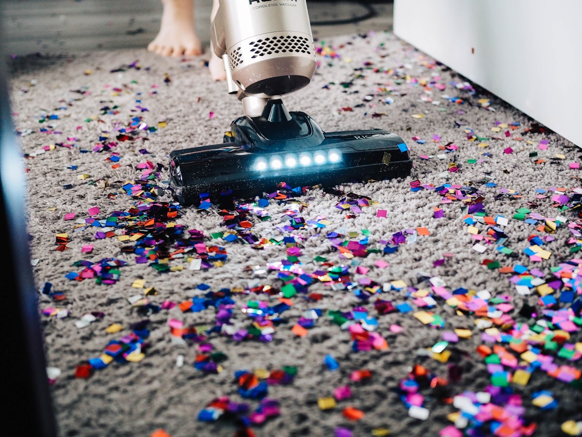 Vacuuming a carpet at home